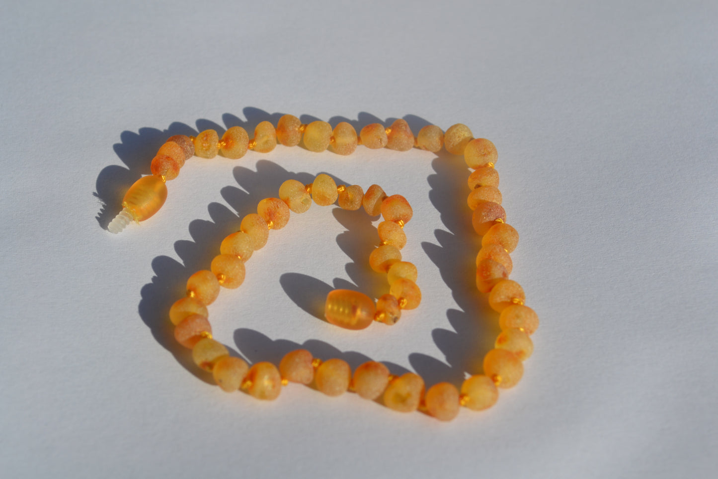 Amber baby necklace raw honey 32cm