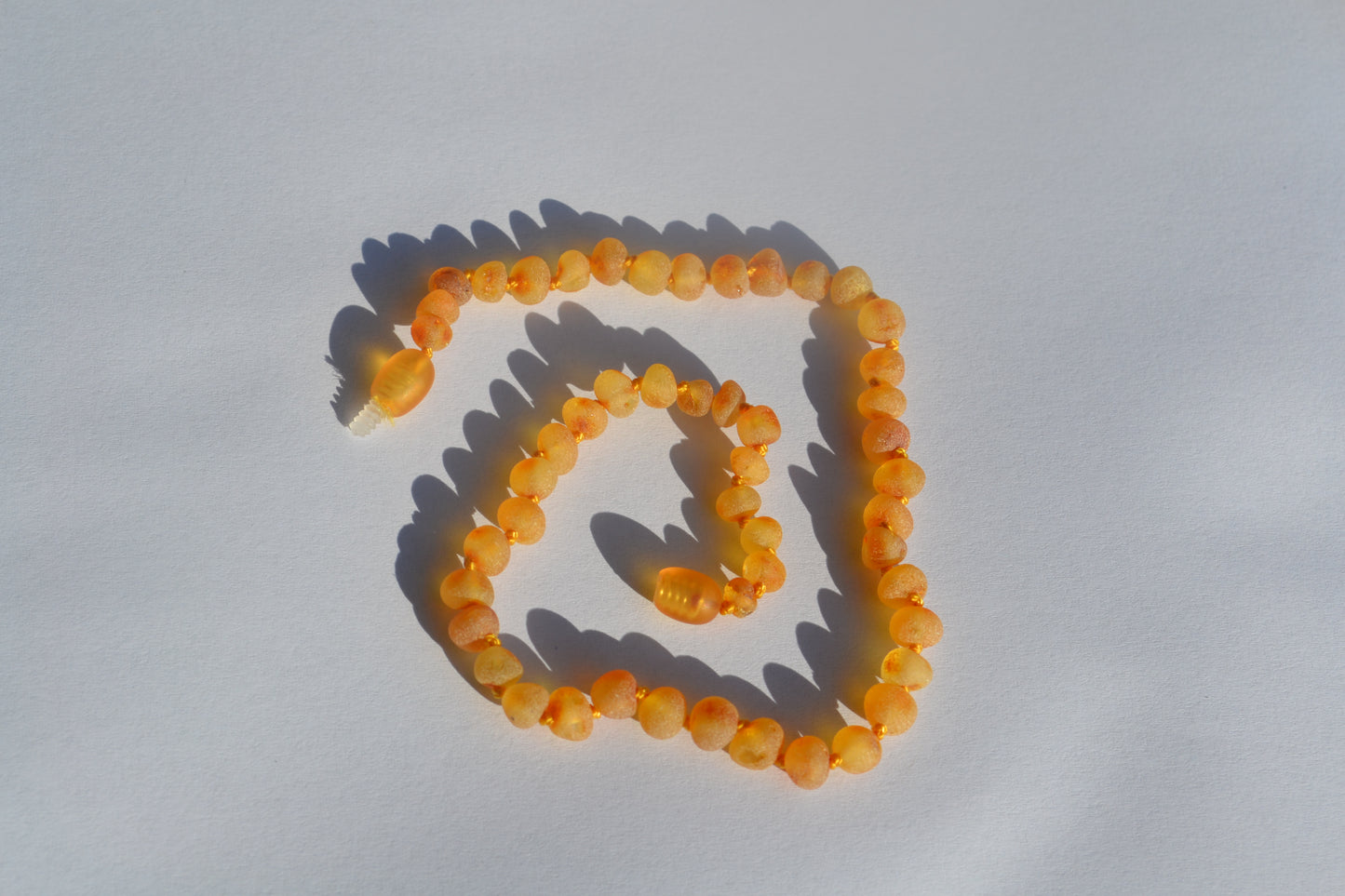 Amber baby necklace raw honey 32cm