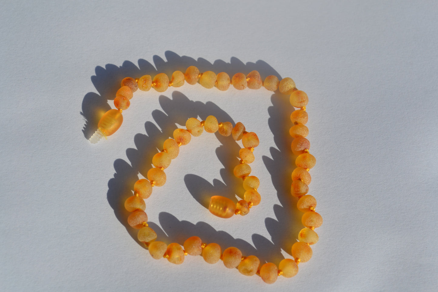 Amber baby necklace raw honey 32cm